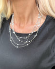Layered pearl necklace styled for feminine boutique fashion