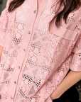 Blush pink oversized crochet shirt styled for coastal boutique fashion