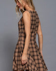 Side view of brown plaid sleeveless swing mini dress