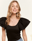 Black ribbed boutique top with feminine flutter sleeves and fitted silhouette