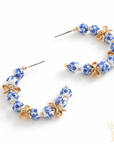Blue floral porcelain bead hoop earrings with gold detailing
