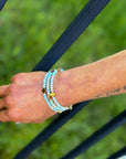 Gold quatrefoil stretch bracelet stack from Halemi & Co.