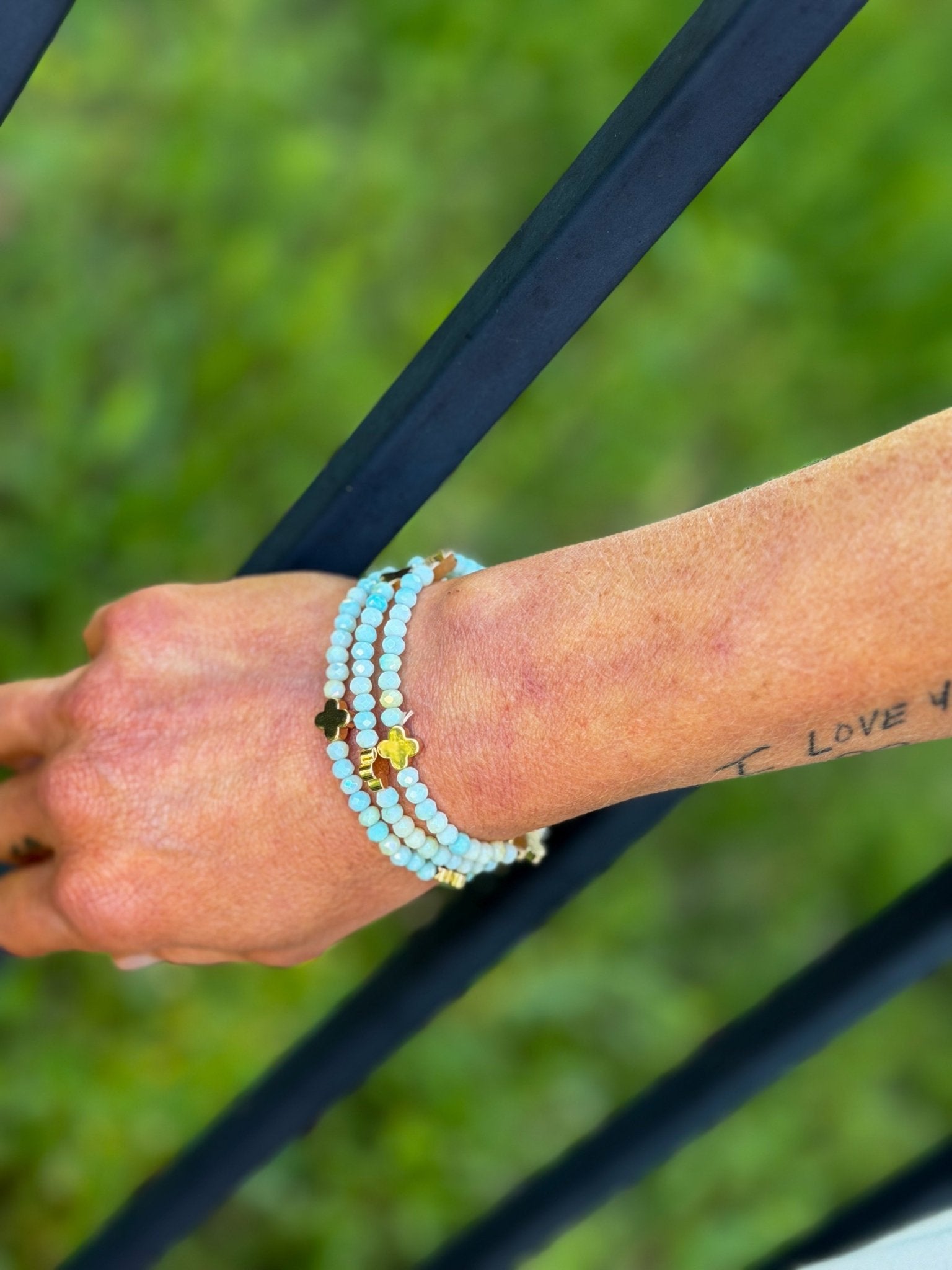Gold quatrefoil stretch bracelet stack from Halemi & Co.
