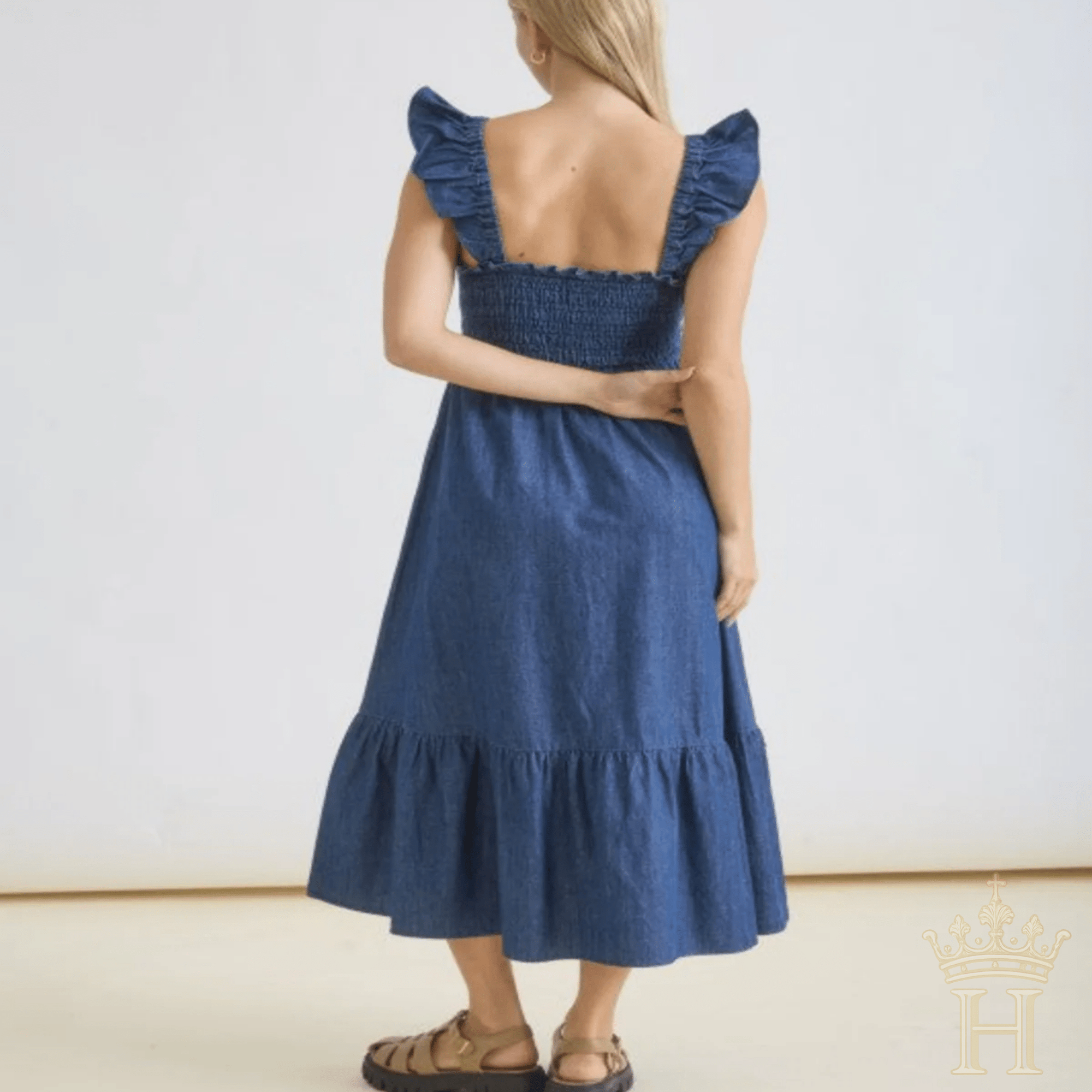 Woman wearing Country Charm ruffle strap midi dress from Halemi & Co.