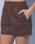 Lightweight brown linen boutique shorts with elastic waistband