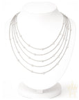 Elegant multi strand pearl necklace with layered styling