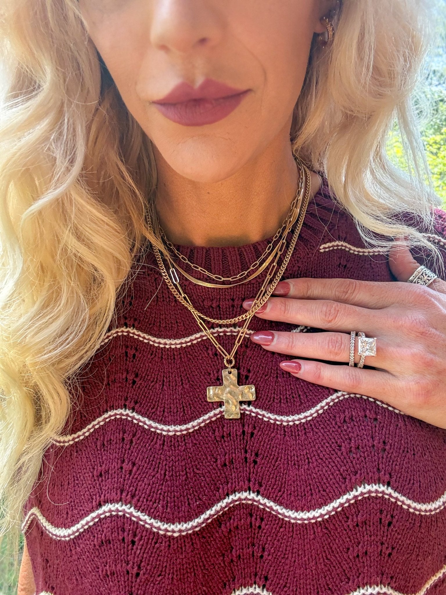Hammered cross multi chain necklace with layered chains, available in gold or silver.