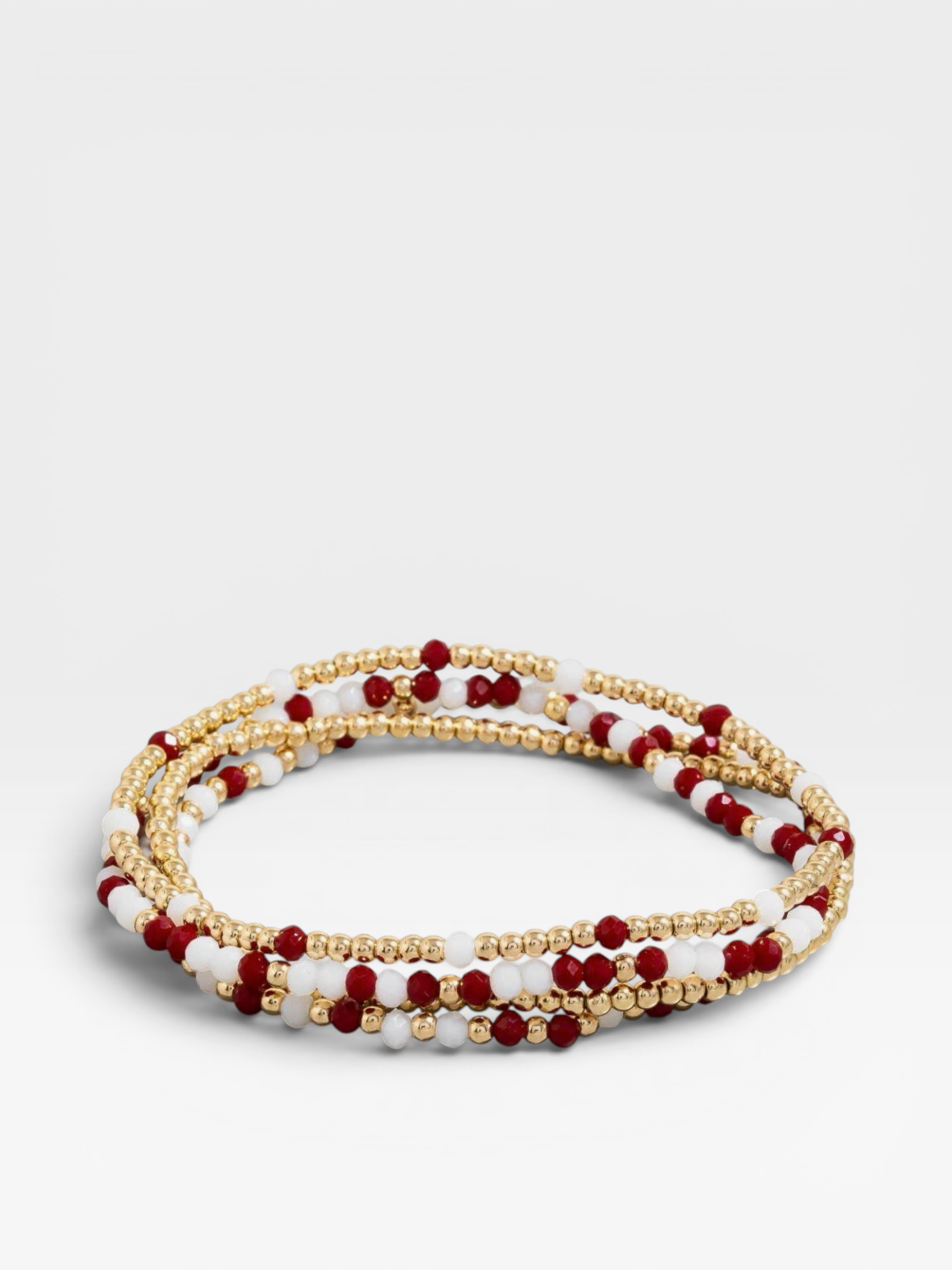 Maroon, white, and gold stretch beaded bracelet designed for game day, school spirit, and football season.