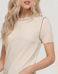 Woman wearing Modern Muse contrast detail top from Halemi & Co.