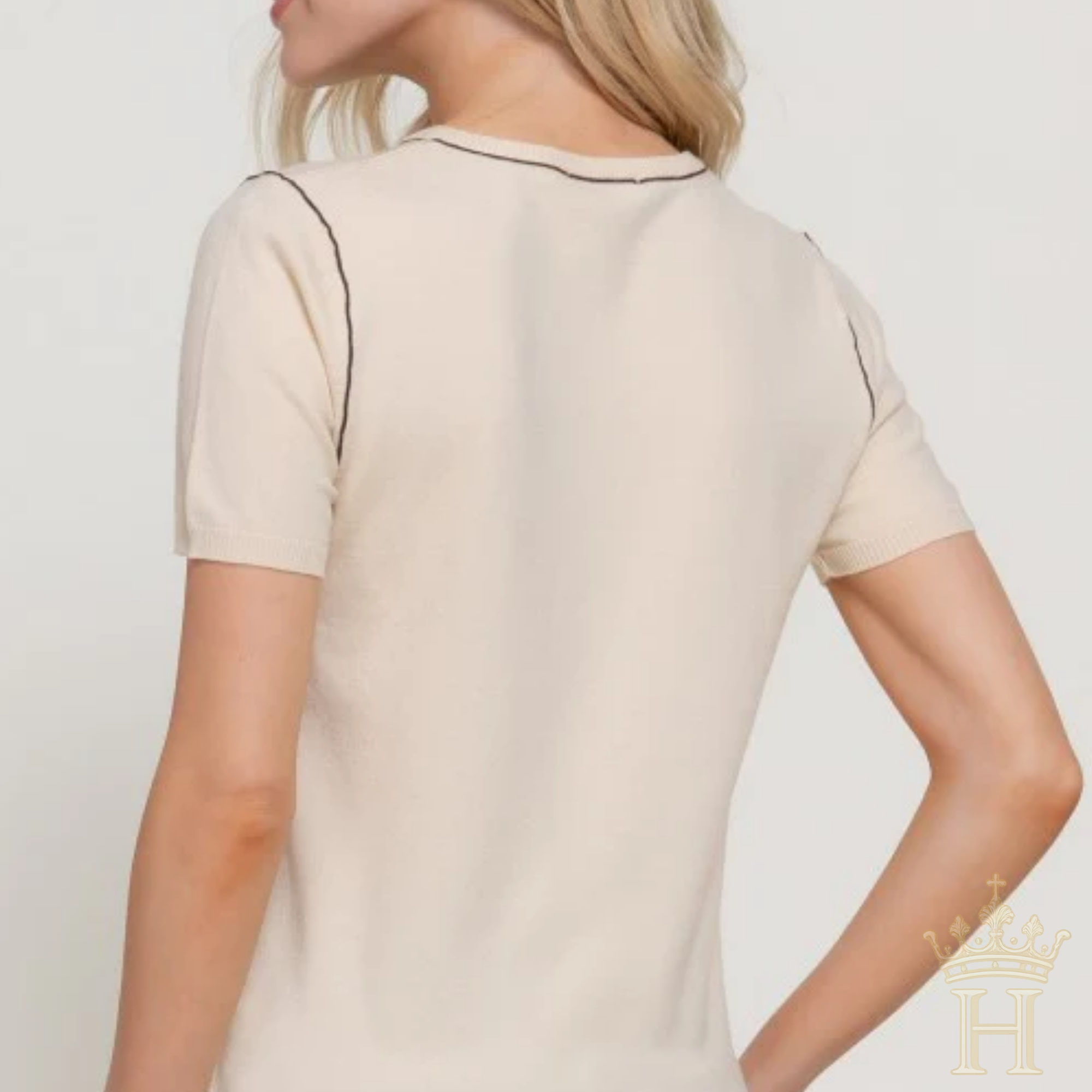 Feminine top with modern contrast trim detailing