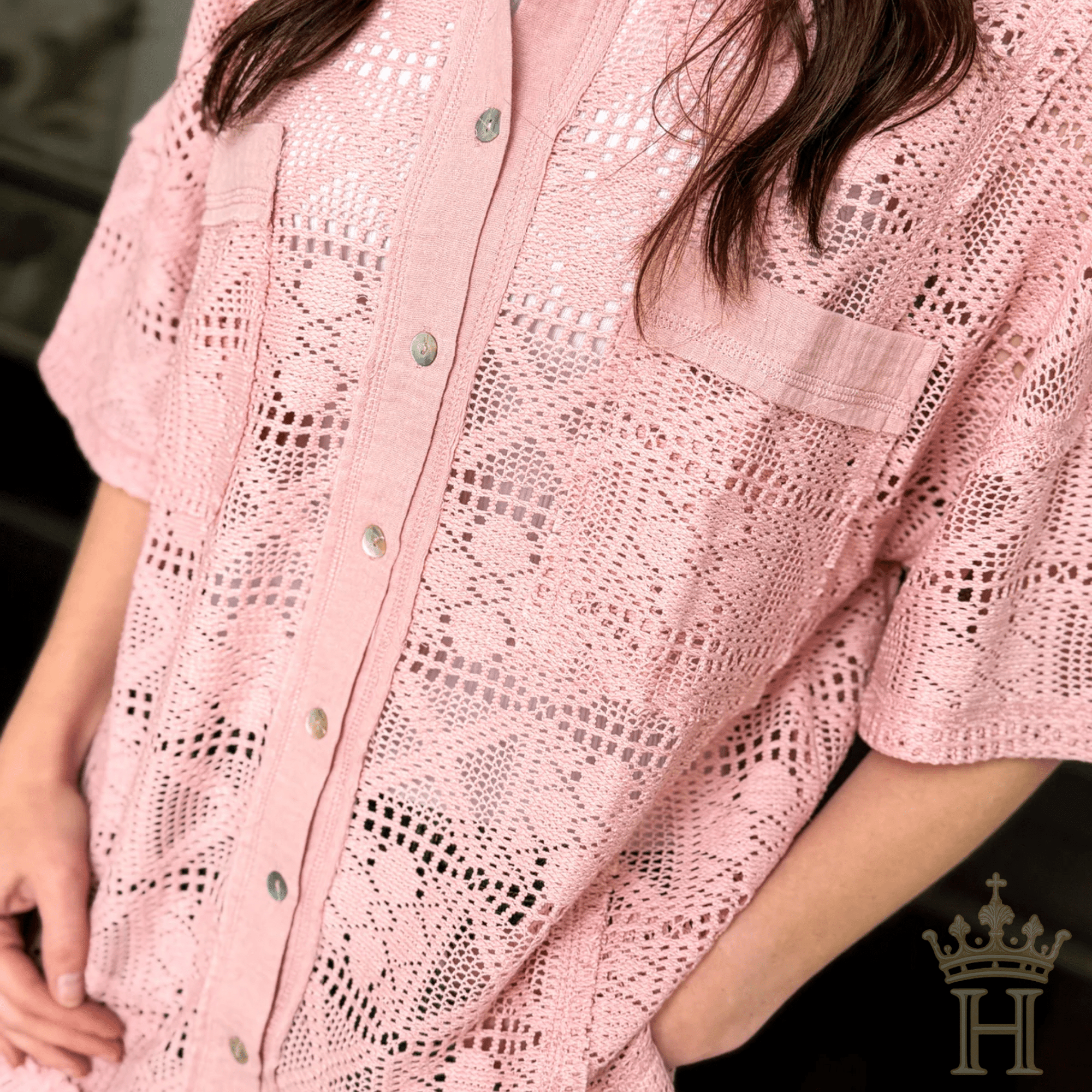 Blush pink oversized crochet shirt styled for coastal boutique fashion