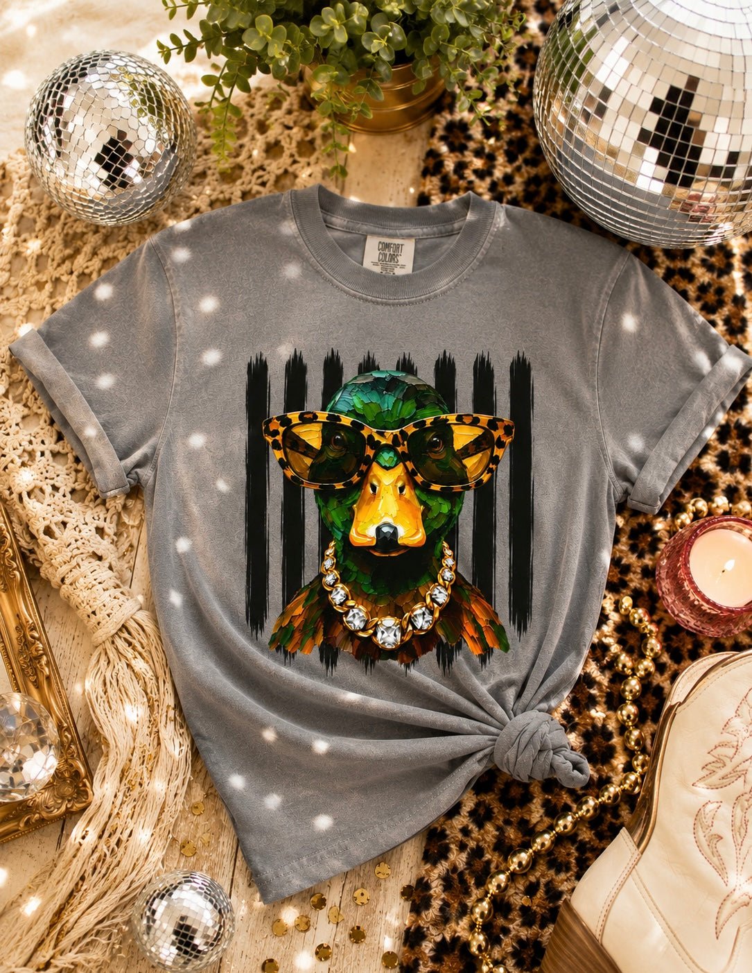 Women’s washed gray graphic tee with colorful duck wearing tortoise glasses and jeweled necklace