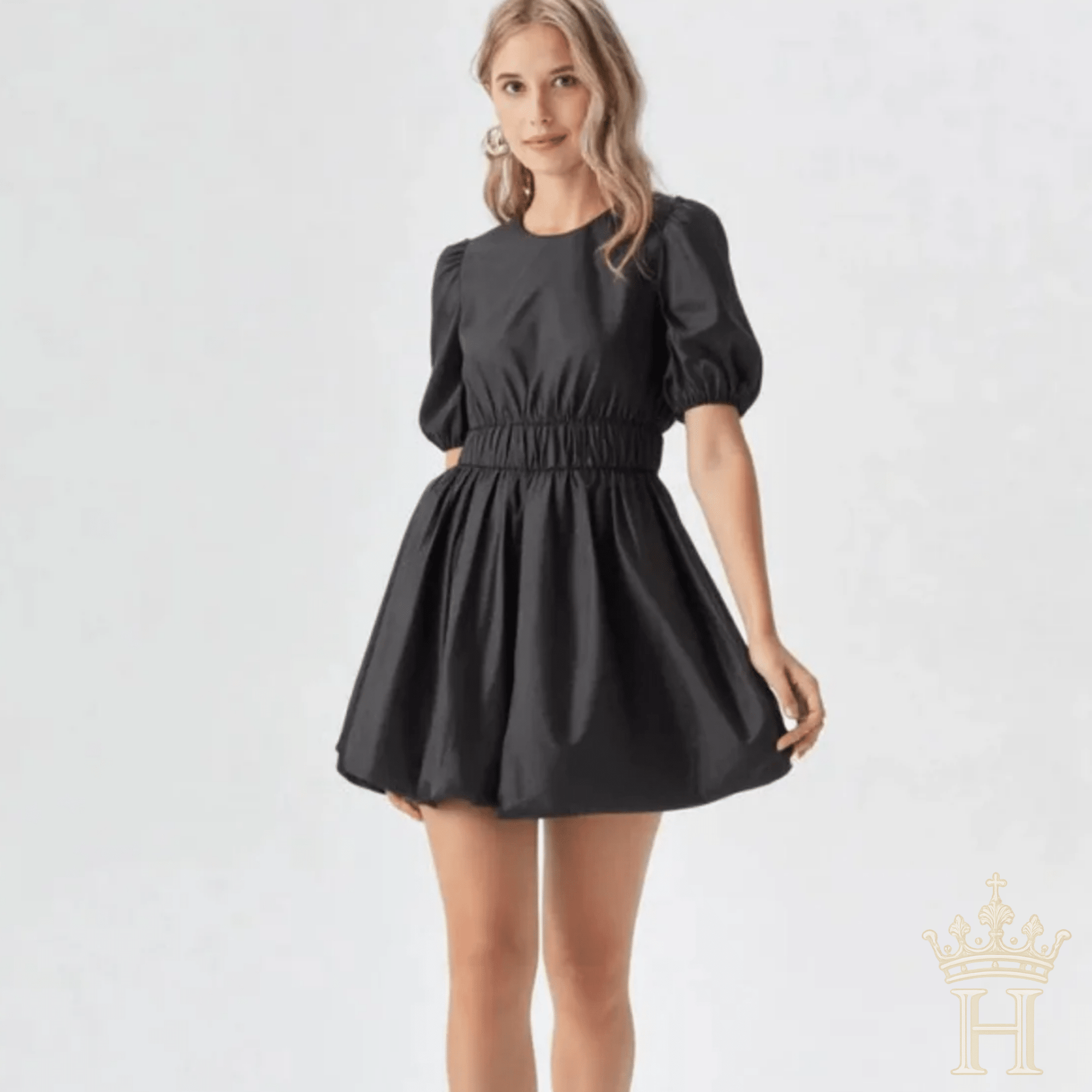 Black mini dress with puff sleeve and bubble hem detailing