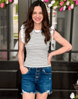 Woman wearing striped ruffle sleeve sweater knit tank from Halemi & Co.