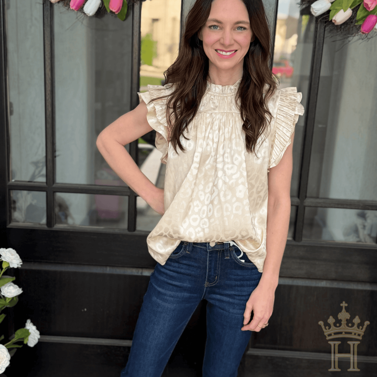 Woman wearing Vervet by Flying Monkey Motivated Crop Flare Jeans featuring comfort stretch denim, a high-rise waist, and a flattering cropped flare silhouette.